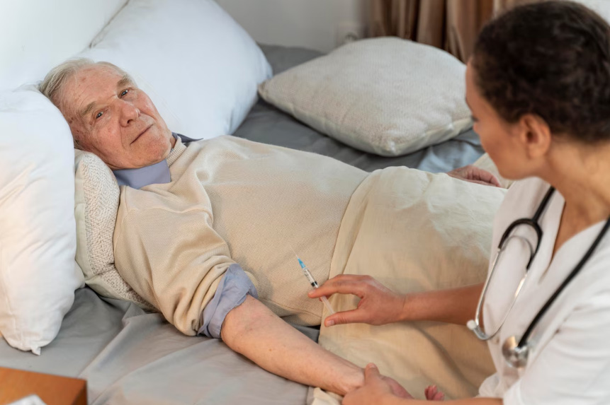 Family discussing hospice care options with a nurse, learning the truth behind common myths
